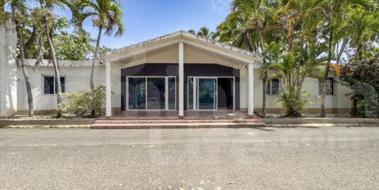 Boutique Hotel with Great Potential – Fixer-Upper Steps from the Beach